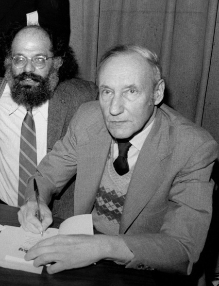 wikipedia commons Allen Ginsberg and William S. Burroughs at the Gotham Book Mart celebrating the reissue of JUNKY, NYC, 1977. Source 	Flickr: More Solomon